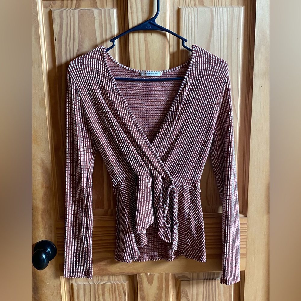 Long sleeve top from Caution to the Wind, burnt orange and white, size small.